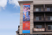 Full Color Mesh Banner installed against Condominium near Gas Works Park | Seattle, WA