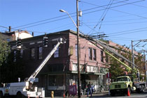 Crane and bucket truck installation on Queen Anne in Seattle, WA