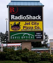 Lighted sign face for optical company in Kenmore, WA