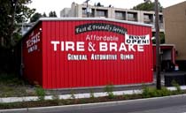 Vinyl Graphics on Heavy Corrugated building in Ballard, WA