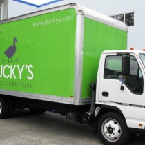 Furniture delivery box truck with full panel graphics in Seattle Washington