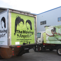 Junk removal trucks with full coverage graphics in Seattle Washington